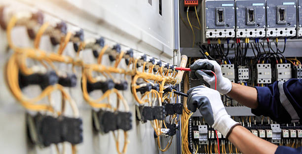 Professional Electrician technician working in Pike Creek Valley, DE